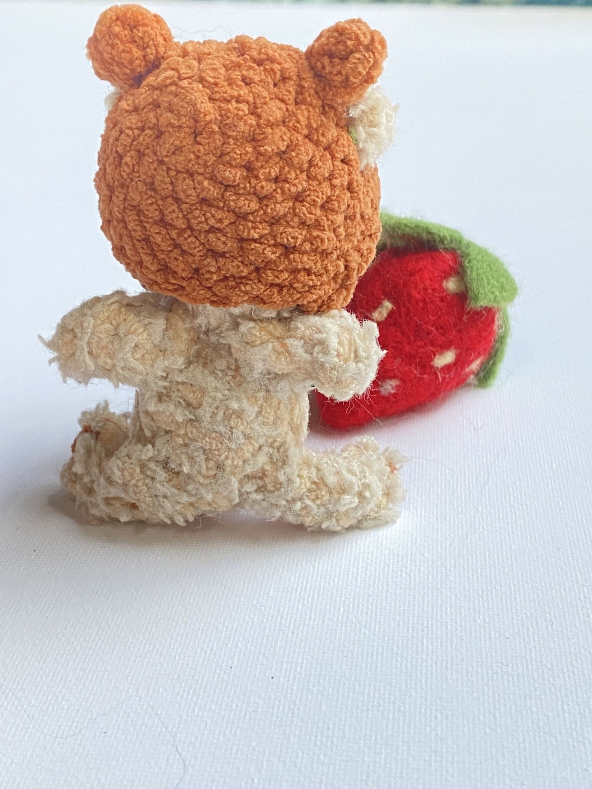Back view of Melennig crochet bear showing fluffy beige body – TchipTchip Studio