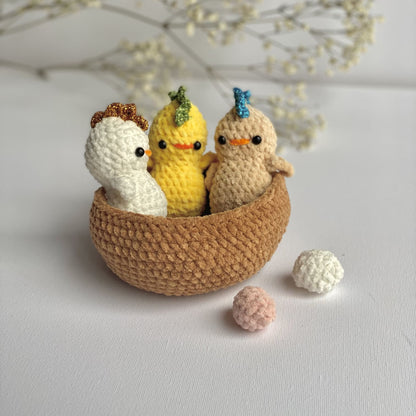 3 little chicks crocheted in a nest